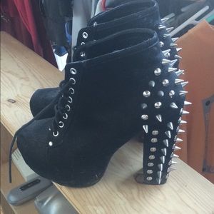 Spiked high boots