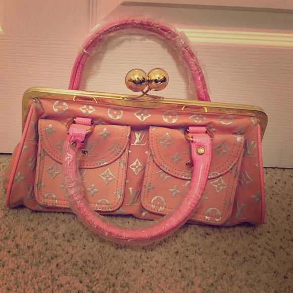 a pink Louis Vuitton bag