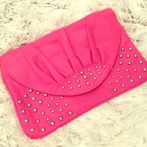 Pink leatherette clutch