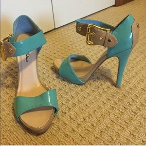 Teal colored heels with beige accent