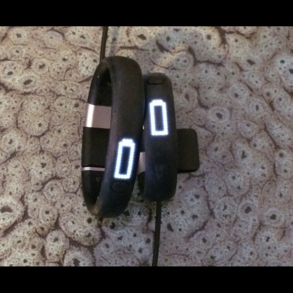 (2) Nike Fuel Bands - Men's and Woman's sized.