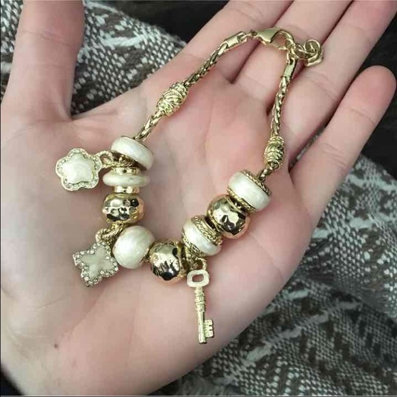 Gold charm bracelet