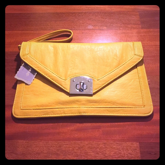 Yellow clutch with removable silver strap