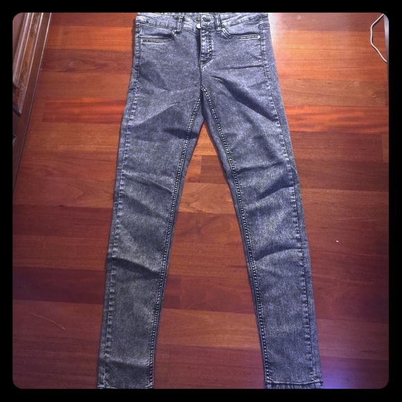 Distressed black and grey jeans