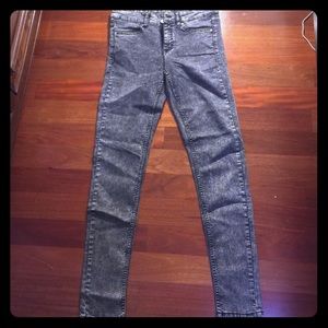 Distressed black and grey jeans