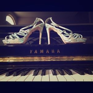 Strappy Badgley Mischka snake skin stilettos