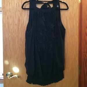 Black ruffle top. Elastic waistband. Tie back.