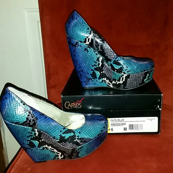 Carlos Santana python blue heels