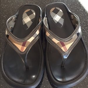 Black Burberry flip flops