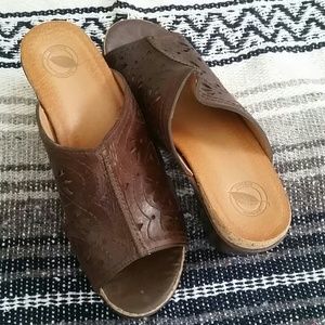 Nurture brown leather slides