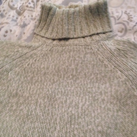 Green turtleneck sweater