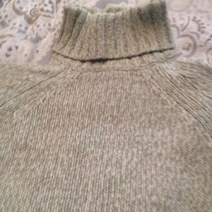 Green turtleneck sweater