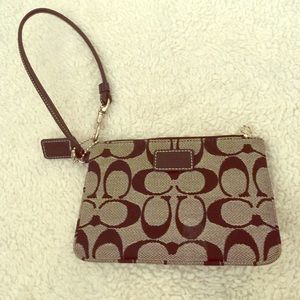 Black and gray coach wristlet