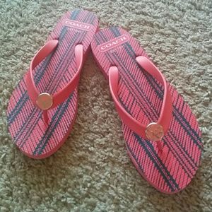 Pink Coach flip flops w/ Coach emblem