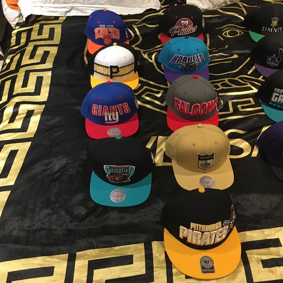 18 pairs of snap backs new & used