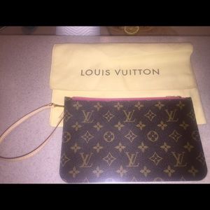 Brand new Louis Vuitton clutch. Dust bag included