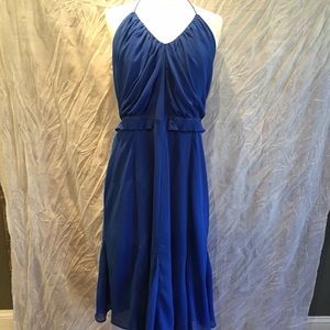 Sleeveless open back dress with ruffles