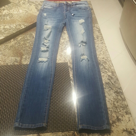 Skinny denim jeans ripped. Brand new never worn.