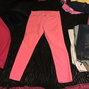 Coral colored skinny jeans