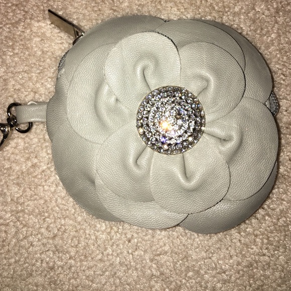 Flower shaped and diamond studded coin wallet