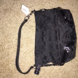 Coach Carly Signature Handbag