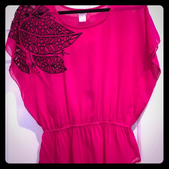 Sheer bright pink top with floral cut out