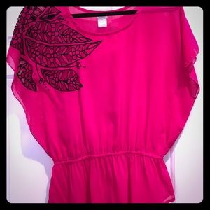 Sheer bright pink top with floral cut out