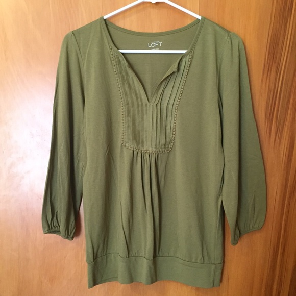 Pea Green shirt, with detailing on the neck!