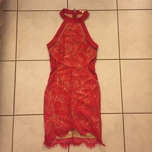 Red lace halter dress.