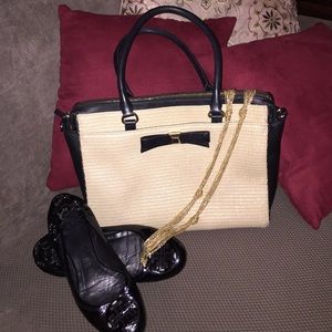 Kate Spade black and straw purse gently used.