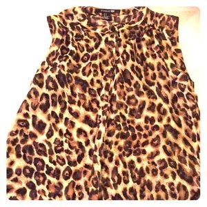 Cheetah print blouse.