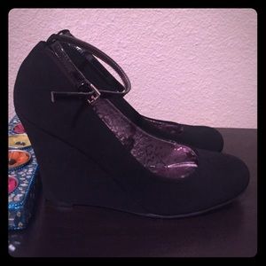 Lightly used black wedges w ankle strap, size 9