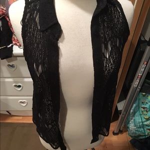 A lacy vest/ shirt