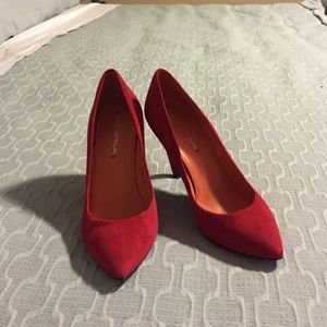 Red suede pumps