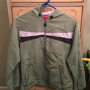 Green windbreaker (offers welcome)