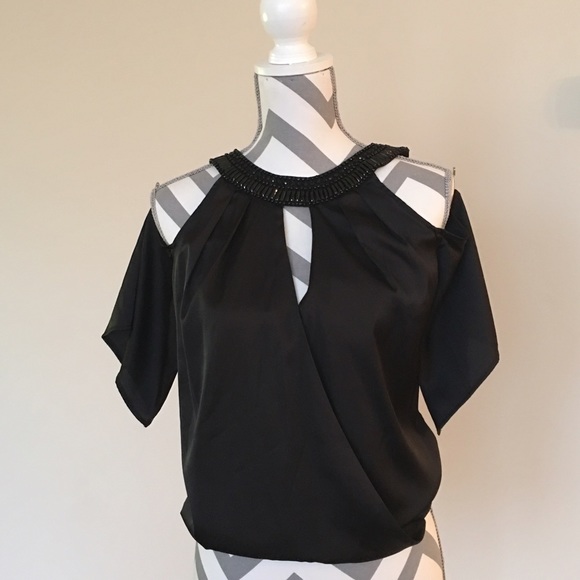 Bebe black cold shoulder top. Like new! Worn once.