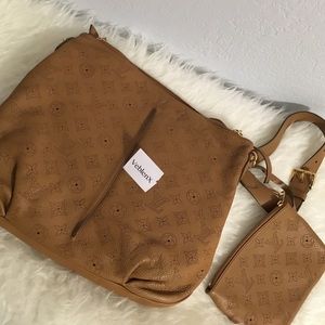LOUIS VUITTON
Leather Monogram Hobo Bag & Wallet
