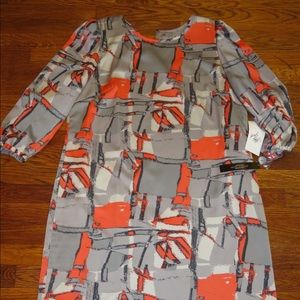 Orange and grey dress. Knee length.