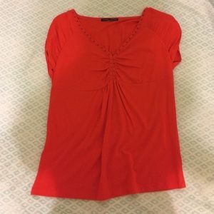 Orange-Red Blouse With Brown Decorative Neckline