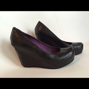 Never worn black leather platforms 9