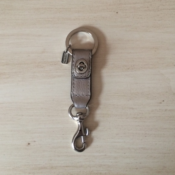 Grey metallic coach keychain