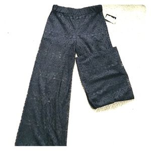 black shorts with a lace overlay for pants