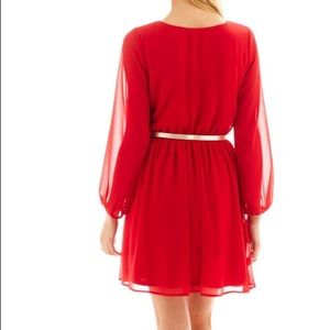 Red dress w/ a gold belt