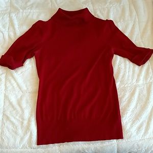Red turtleneck sweater