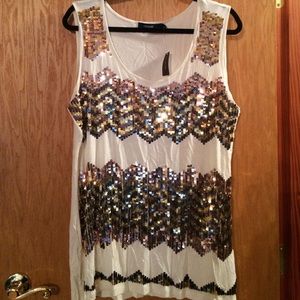 Cream top with gold/bronze/black sequins.