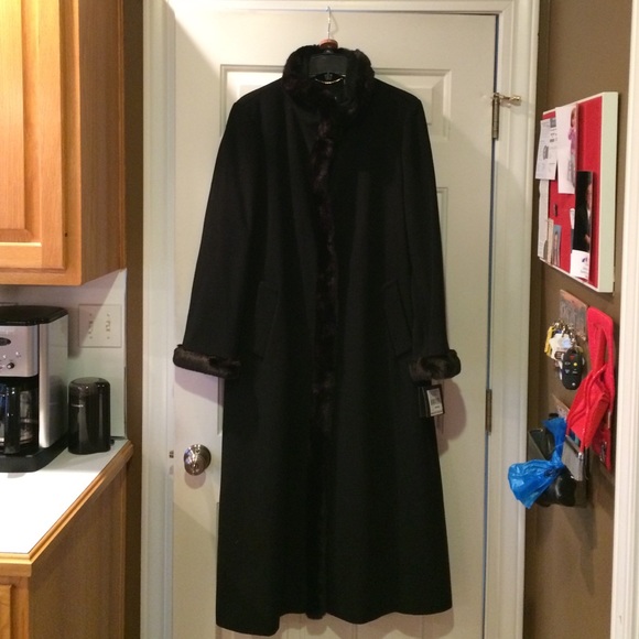 Never worn coat w Faux Fur around neck and cuffs