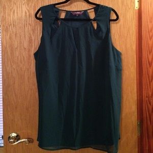 Top with cutout at neck and back! 100% polyester.