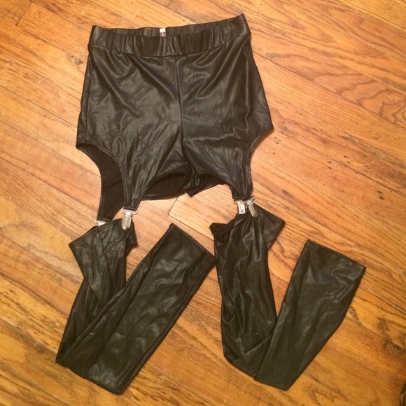 Black "wet look" suspender leggings.