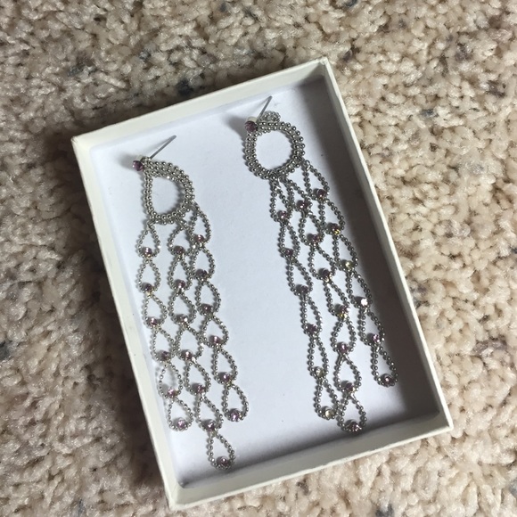Long dangling silver and purple earrings