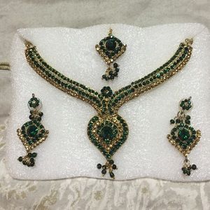 Necklaces and earrings and head piece